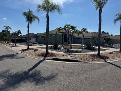 Gorgeous 3 Bedroom 2 Bathroom 3 Car Garage Plus Office/Den Pool on Apollo Beach Golf and Sea Club in Florida - for sale on GolfHomes.com, golf home, golf lot