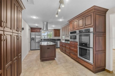 One or more photo(s) has been virtually staged. Are you planning on Jacaranda West Country Club in Florida - for sale on GolfHomes.com, golf home, golf lot