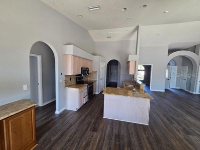 Gorgeous 3 Bedroom 2 Bathroom 3 Car Garage Plus Office/Den Pool on Apollo Beach Golf and Sea Club in Florida - for sale on GolfHomes.com, golf home, golf lot