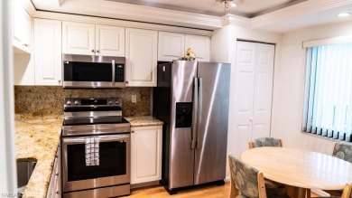 Discover the perfect blend of comfort and convenience in this on Riviera Golf Club in Florida - for sale on GolfHomes.com, golf home, golf lot