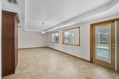 One or more photo(s) has been virtually staged. Are you planning on Jacaranda West Country Club in Florida - for sale on GolfHomes.com, golf home, golf lot