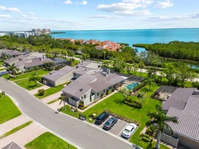 Experience the ultimate in island living in the highly on Longboat Key Golf Club Resort in Florida - for sale on GolfHomes.com, golf home, golf lot