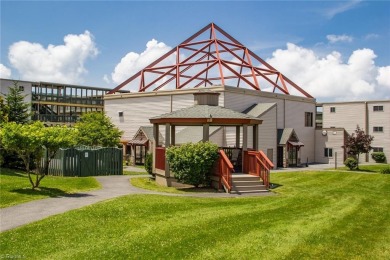 Enjoy ski slope views from this updated, turnkey two bedroom on Beech Mountain Club in North Carolina - for sale on GolfHomes.com, golf home, golf lot