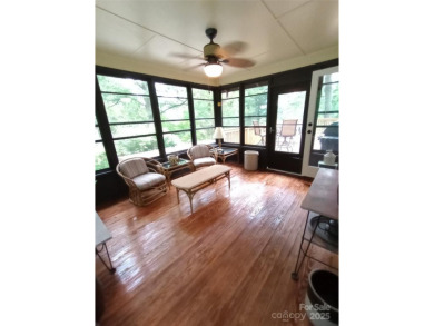 Charming and unique home nestled in Country Club Estates on Hendersonville Country Club in North Carolina - for sale on GolfHomes.com, golf home, golf lot