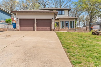 Looking for a fully updated Table Rock Lake view home within on Kimberling City Golf Club in Missouri - for sale on GolfHomes.com, golf home, golf lot