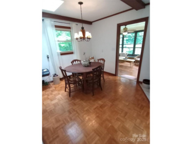 Charming and unique home nestled in Country Club Estates on Hendersonville Country Club in North Carolina - for sale on GolfHomes.com, golf home, golf lot