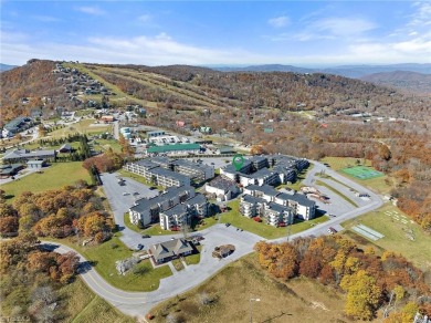 Enjoy ski slope views from this updated, turnkey two bedroom on Beech Mountain Club in North Carolina - for sale on GolfHomes.com, golf home, golf lot