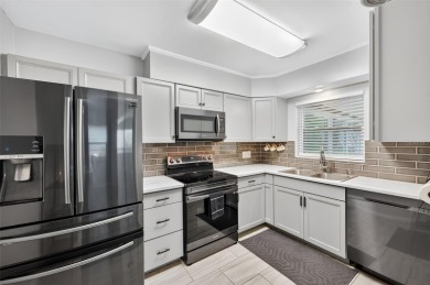 Beautifully Renovated Clearwater home that is just minutes to on Clearwater Country Club in Florida - for sale on GolfHomes.com, golf home, golf lot