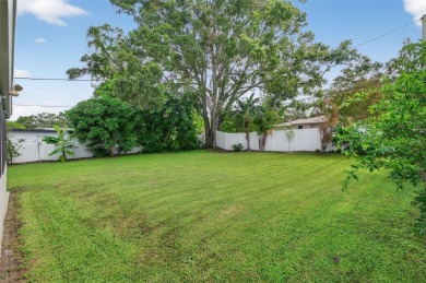 Beautifully Renovated Clearwater home that is just minutes to on Clearwater Country Club in Florida - for sale on GolfHomes.com, golf home, golf lot