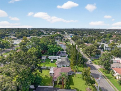 Beautifully Renovated Clearwater home that is just minutes to on Clearwater Country Club in Florida - for sale on GolfHomes.com, golf home, golf lot