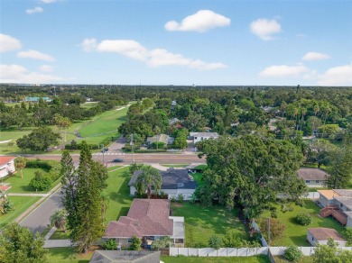 Beautifully Renovated Clearwater home that is just minutes to on Clearwater Country Club in Florida - for sale on GolfHomes.com, golf home, golf lot