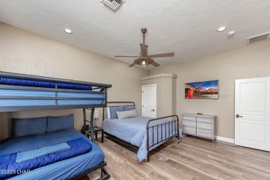 Welcome to 2175 Palmer Drive, Luxury living on the green in the on London Bridge Golf Course in Arizona - for sale on GolfHomes.com, golf home, golf lot