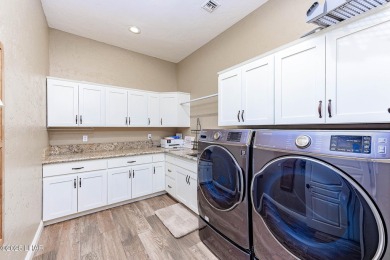 Welcome to 2175 Palmer Drive, Luxury living on the green in the on London Bridge Golf Course in Arizona - for sale on GolfHomes.com, golf home, golf lot