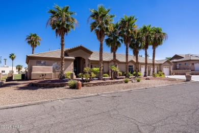Welcome to 2175 Palmer Drive, Luxury living on the green in the on London Bridge Golf Course in Arizona - for sale on GolfHomes.com, golf home, golf lot