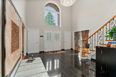 Welcome to this elegant and spacious 5-bedroom, 3.1-bath home on Royal Melbourne in Illinois - for sale on GolfHomes.com, golf home, golf lot