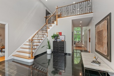 Welcome to this elegant and spacious 5-bedroom, 3.1-bath home on Royal Melbourne in Illinois - for sale on GolfHomes.com, golf home, golf lot