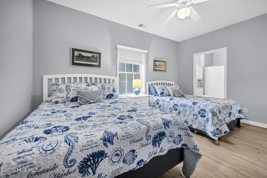 Experience the pinnacle of coastal living in this elegant on Sea Trail Golf Resort in North Carolina - for sale on GolfHomes.com, golf home, golf lot