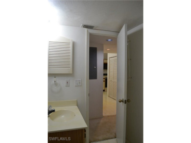 Welcome to this desirable all original first-floor condo in on Riviera Golf Club in Florida - for sale on GolfHomes.com, golf home, golf lot