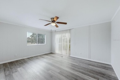 Welcome to this charming double-wide manufactured home located on Lemon Bay Golf Club in Florida - for sale on GolfHomes.com, golf home, golf lot