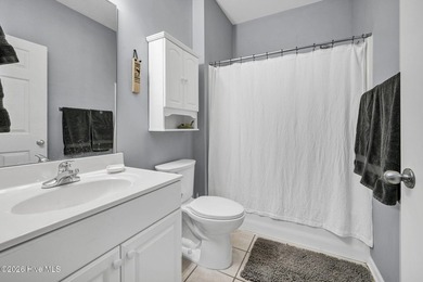 Experience the pinnacle of coastal living in this elegant on Sea Trail Golf Resort in North Carolina - for sale on GolfHomes.com, golf home, golf lot