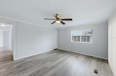 Welcome to this charming double-wide manufactured home located on Lemon Bay Golf Club in Florida - for sale on GolfHomes.com, golf home, golf lot