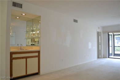 Welcome to this desirable all original first-floor condo in on Riviera Golf Club in Florida - for sale on GolfHomes.com, golf home, golf lot