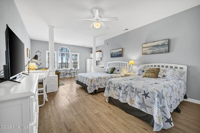 Experience the pinnacle of coastal living in this elegant on Sea Trail Golf Resort in North Carolina - for sale on GolfHomes.com, golf home, golf lot