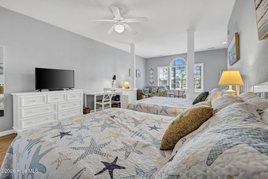 Experience the pinnacle of coastal living in this elegant on Sea Trail Golf Resort in North Carolina - for sale on GolfHomes.com, golf home, golf lot