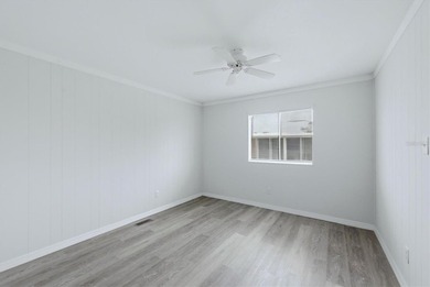 Welcome to this charming double-wide manufactured home located on Lemon Bay Golf Club in Florida - for sale on GolfHomes.com, golf home, golf lot