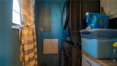 Discover the perfect blend of comfort and convenience at 101 on Seasons Ridge At Four Seasons in Missouri - for sale on GolfHomes.com, golf home, golf lot