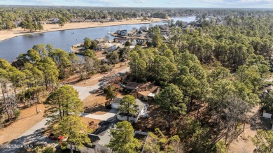 Nestled in the gated coastal community of Fairfield Harbour on Harbour Point Golf Club in North Carolina - for sale on GolfHomes.com, golf home, golf lot