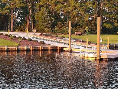 Nestled in the gated coastal community of Fairfield Harbour on Harbour Point Golf Club in North Carolina - for sale on GolfHomes.com, golf home, golf lot