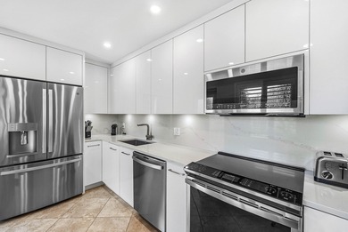 Beautifully renovated 2nd-floor condo with serene golf course on Quail Ridge Golf Course and Country Club in Florida - for sale on GolfHomes.com, golf home, golf lot