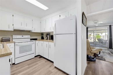 Welcome home to 877 Queensway Road South in award winning Maple on Maple Leaf Golf and Country Club in Florida - for sale on GolfHomes.com, golf home, golf lot
