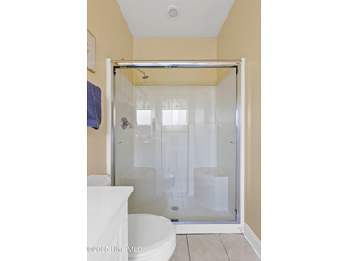 Experience the tranquility of Castle Bay's Scottish Links-style on Castle Bay Golf and Country Club in North Carolina - for sale on GolfHomes.com, golf home, golf lot