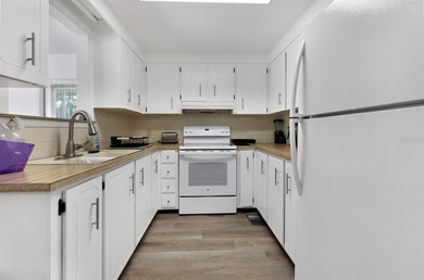 Welcome home to 877 Queensway Road South in award winning Maple on Maple Leaf Golf and Country Club in Florida - for sale on GolfHomes.com, golf home, golf lot