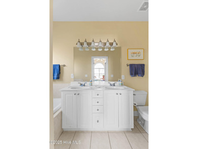 Experience the tranquility of Castle Bay's Scottish Links-style on Castle Bay Golf and Country Club in North Carolina - for sale on GolfHomes.com, golf home, golf lot