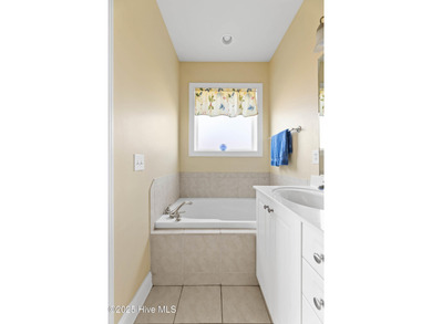 Experience the tranquility of Castle Bay's Scottish Links-style on Castle Bay Golf and Country Club in North Carolina - for sale on GolfHomes.com, golf home, golf lot