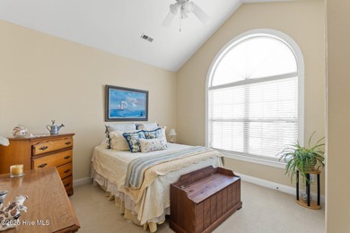 Experience the tranquility of Castle Bay's Scottish Links-style on Castle Bay Golf and Country Club in North Carolina - for sale on GolfHomes.com, golf home, golf lot