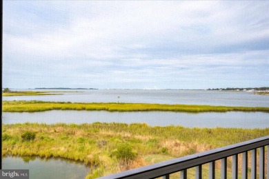 Direct bay views abound from this beautiful 2-story condo in on Bethany Bay Golf Club in Delaware - for sale on GolfHomes.com, golf home, golf lot