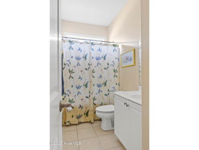 Experience the tranquility of Castle Bay's Scottish Links-style on Castle Bay Golf and Country Club in North Carolina - for sale on GolfHomes.com, golf home, golf lot