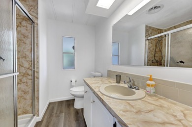 Welcome home to 877 Queensway Road South in award winning Maple on Maple Leaf Golf and Country Club in Florida - for sale on GolfHomes.com, golf home, golf lot