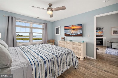 Direct bay views abound from this beautiful 2-story condo in on Bethany Bay Golf Club in Delaware - for sale on GolfHomes.com, golf home, golf lot