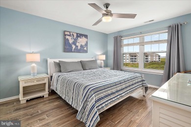 Direct bay views abound from this beautiful 2-story condo in on Bethany Bay Golf Club in Delaware - for sale on GolfHomes.com, golf home, golf lot