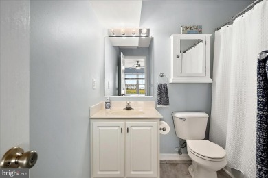 Direct bay views abound from this beautiful 2-story condo in on Bethany Bay Golf Club in Delaware - for sale on GolfHomes.com, golf home, golf lot