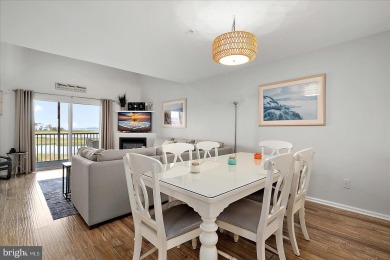 Direct bay views abound from this beautiful 2-story condo in on Bethany Bay Golf Club in Delaware - for sale on GolfHomes.com, golf home, golf lot