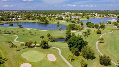 Welcome home to 877 Queensway Road South in award winning Maple on Maple Leaf Golf and Country Club in Florida - for sale on GolfHomes.com, golf home, golf lot