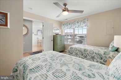 Direct bay views abound from this beautiful 2-story condo in on Bethany Bay Golf Club in Delaware - for sale on GolfHomes.com, golf home, golf lot