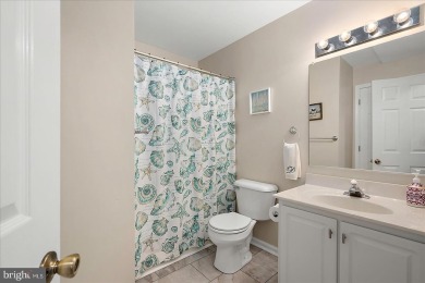 Direct bay views abound from this beautiful 2-story condo in on Bethany Bay Golf Club in Delaware - for sale on GolfHomes.com, golf home, golf lot