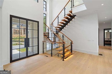 Welcome to a statement home in the prestigious Echelon community on Echelon Golf Club in Georgia - for sale on GolfHomes.com, golf home, golf lot